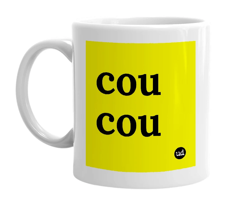 White mug with 'cou cou' in bold black letters