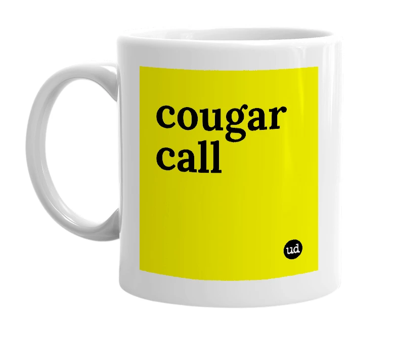 White mug with 'cougar call' in bold black letters