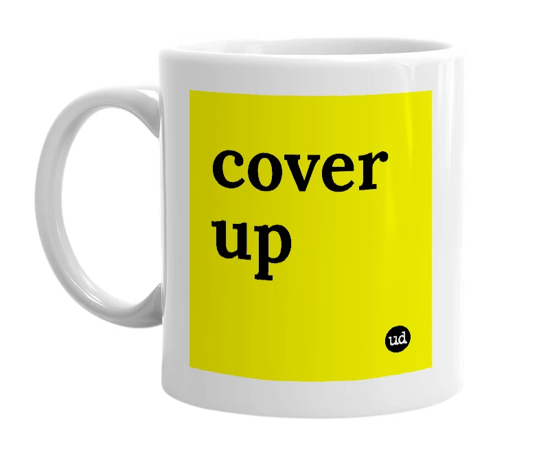 White mug with 'cover up' in bold black letters