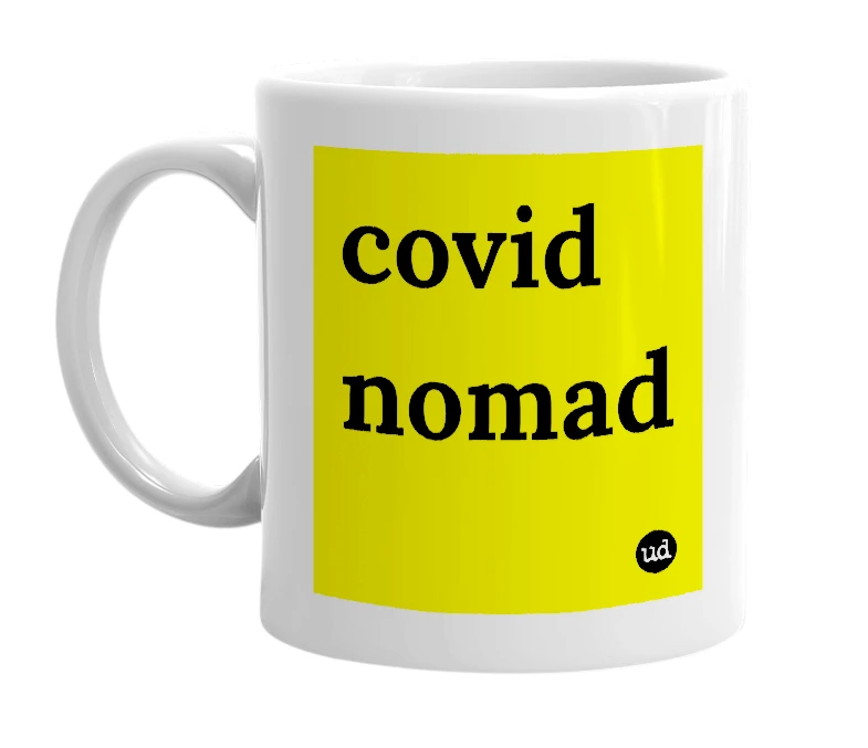 White mug with 'covid nomad' in bold black letters