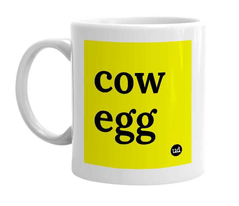White mug with 'cow egg' in bold black letters