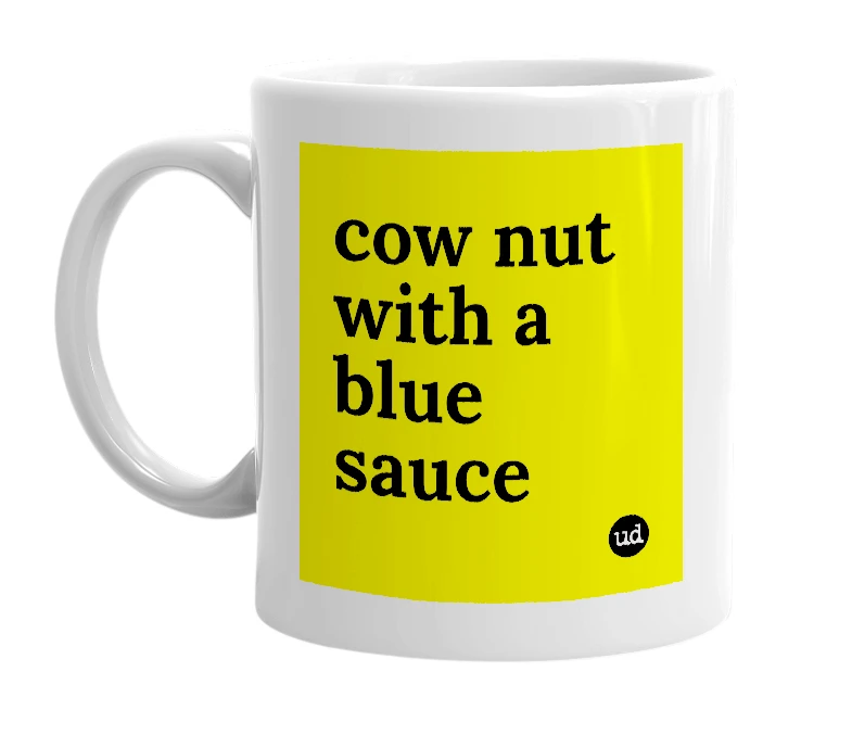 White mug with 'cow nut with a blue sauce' in bold black letters