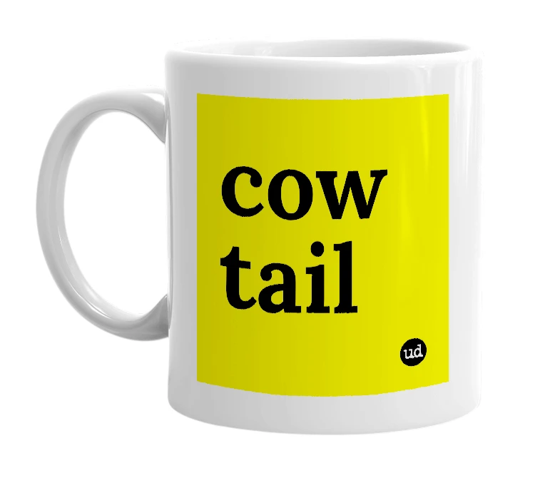White mug with 'cow tail' in bold black letters