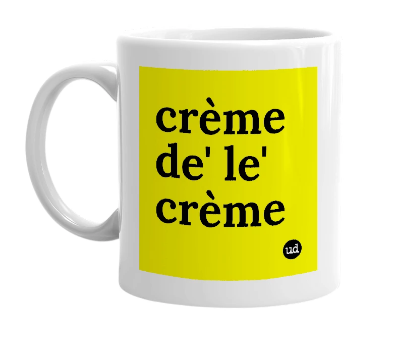 White mug with 'crème de' le' crème' in bold black letters