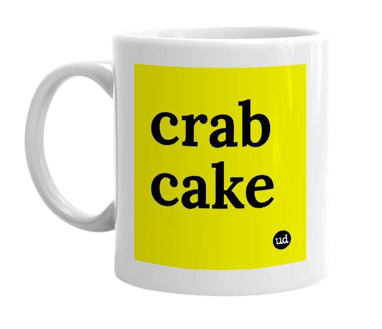 White mug with 'crab cake' in bold black letters