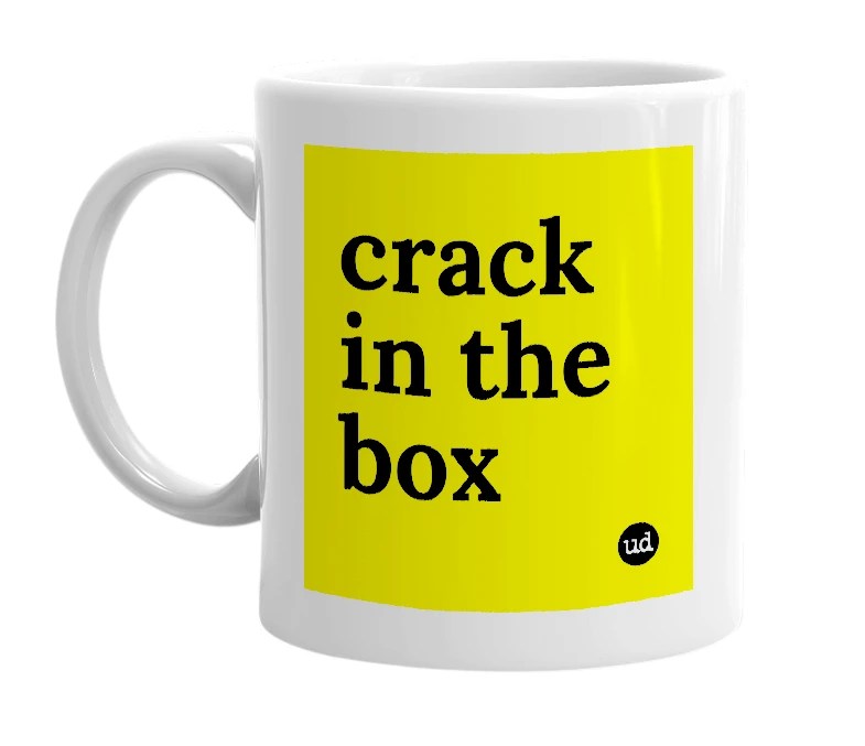 White mug with 'crack in the box' in bold black letters