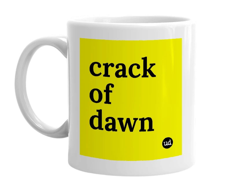 White mug with 'crack of dawn' in bold black letters