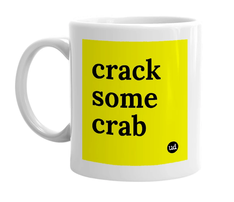 White mug with 'crack some crab' in bold black letters