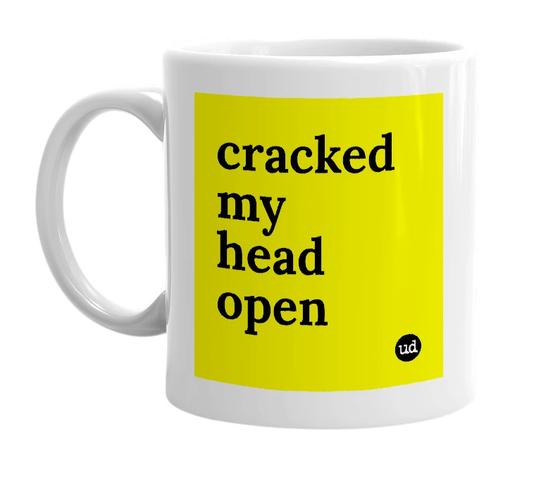 White mug with 'cracked my head open' in bold black letters