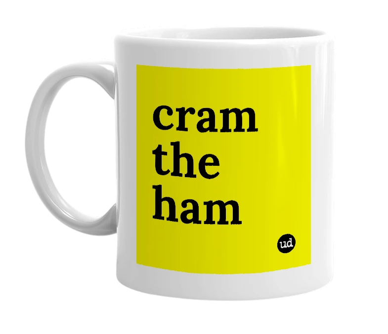 White mug with 'cram the ham' in bold black letters