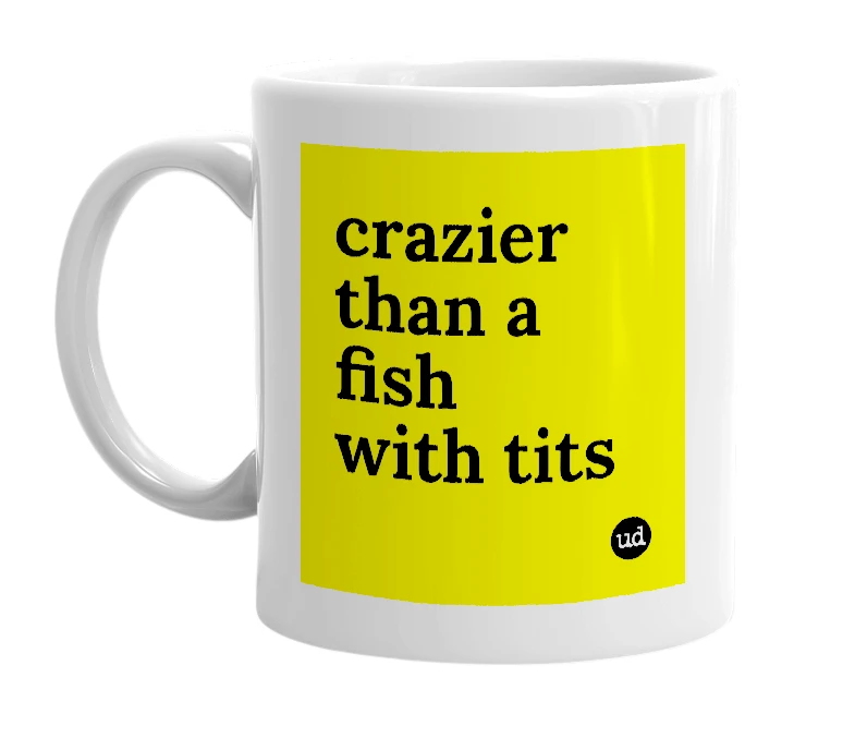 White mug with 'crazier than a fish with tits' in bold black letters