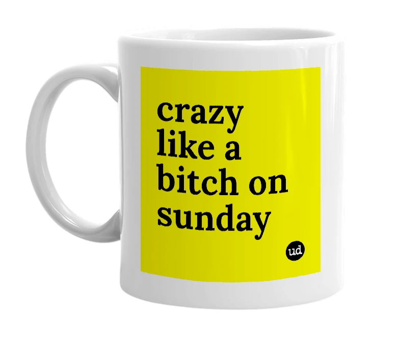 White mug with 'crazy like a bitch on sunday' in bold black letters