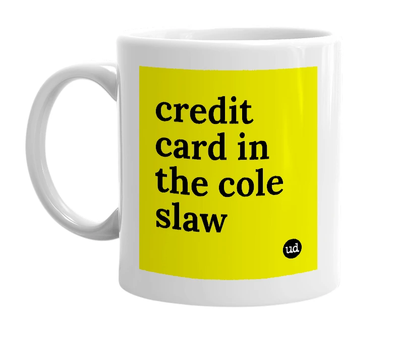 White mug with 'credit card in the cole slaw' in bold black letters