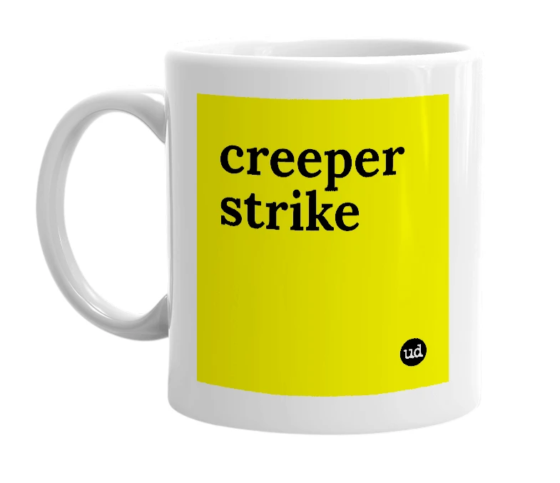 White mug with 'creeper strike' in bold black letters