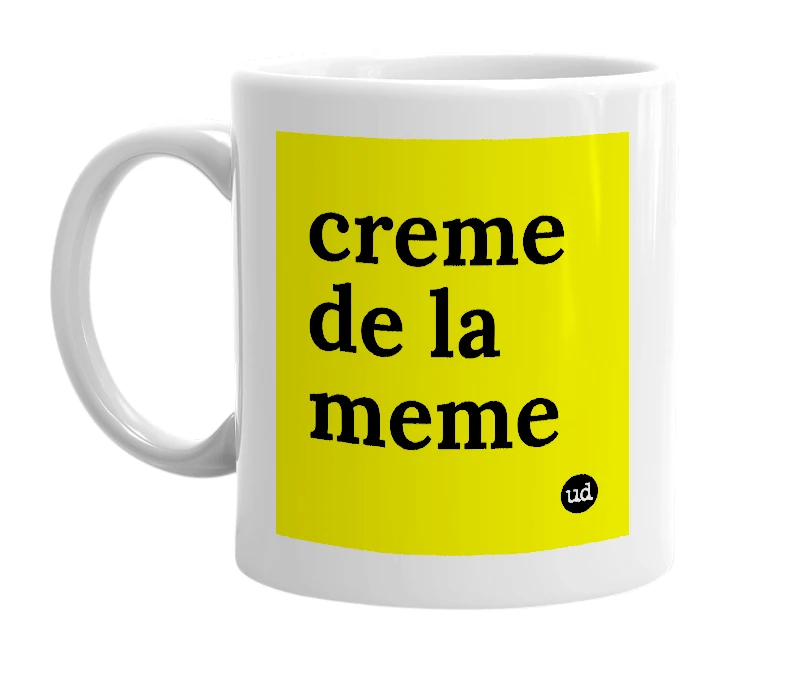White mug with 'creme de la meme' in bold black letters