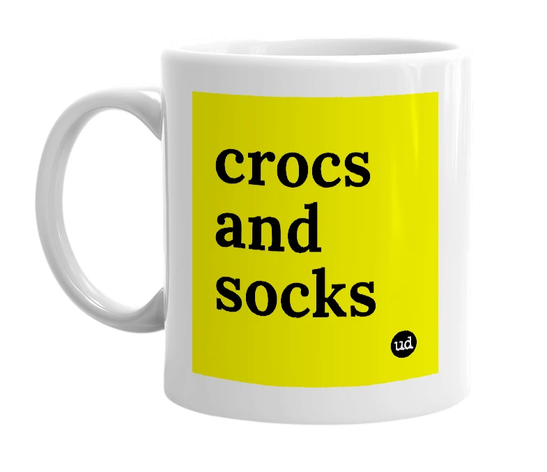 White mug with 'crocs and socks' in bold black letters