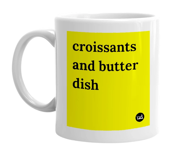 White mug with 'croissants and butter dish' in bold black letters