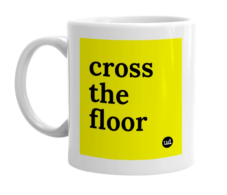 White mug with 'cross the floor' in bold black letters