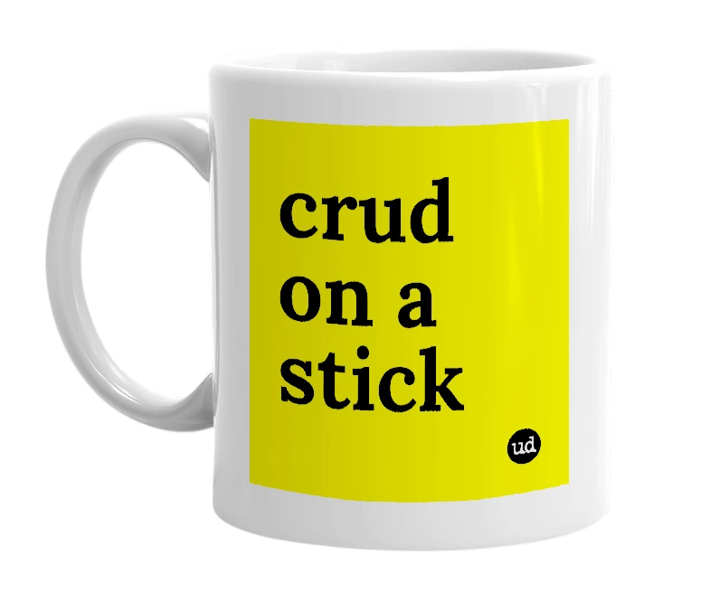 White mug with 'crud on a stick' in bold black letters