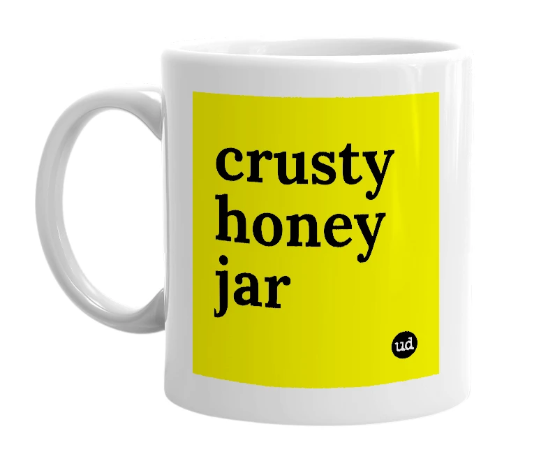 White mug with 'crusty honey jar' in bold black letters