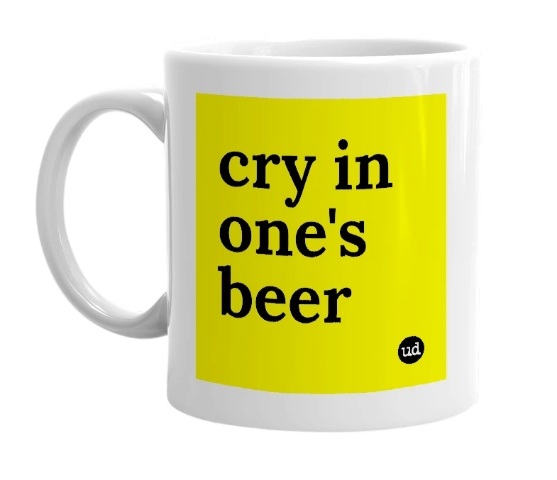 White mug with 'cry in one's beer' in bold black letters