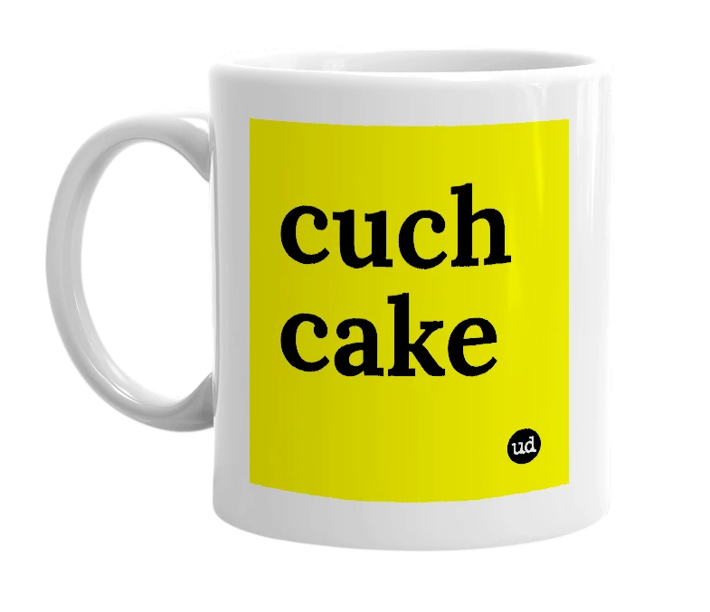 White mug with 'cuch cake' in bold black letters