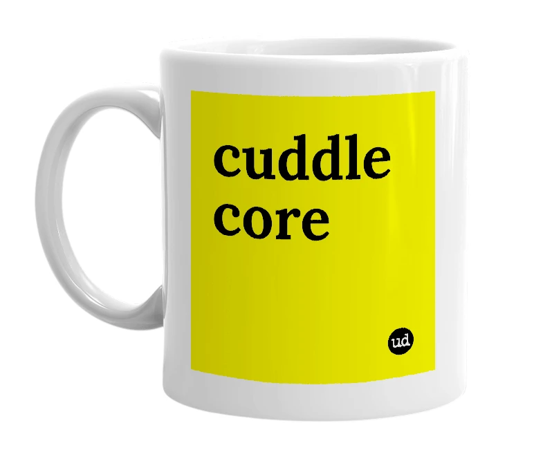 White mug with 'cuddle core' in bold black letters