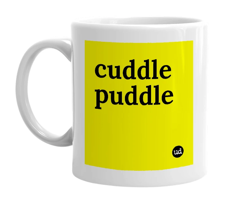 White mug with 'cuddle puddle' in bold black letters