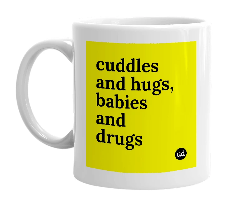 White mug with 'cuddles and hugs, babies and drugs' in bold black letters