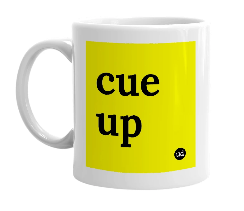 White mug with 'cue up' in bold black letters