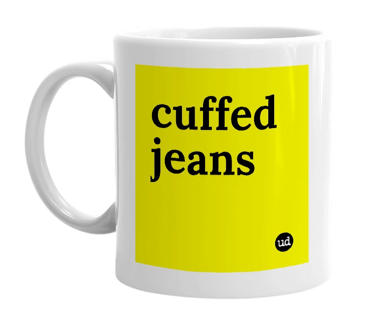 White mug with 'cuffed jeans' in bold black letters