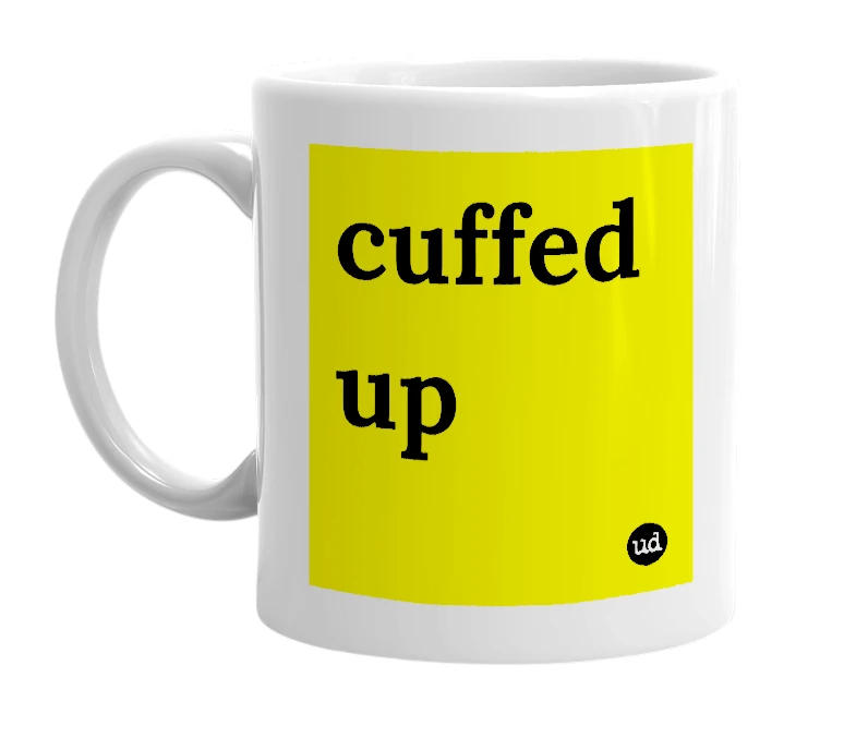 White mug with 'cuffed up' in bold black letters