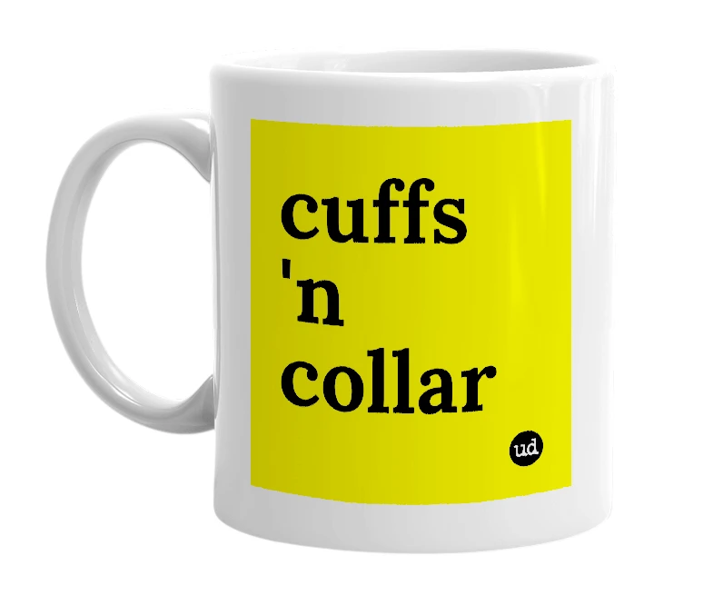 White mug with 'cuffs 'n collar' in bold black letters