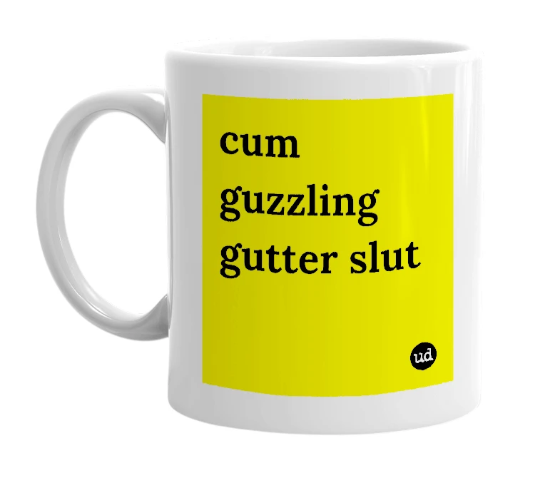 White mug with 'cum guzzling gutter slut' in bold black letters
