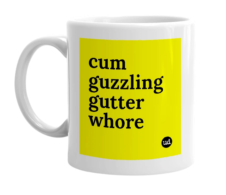 White mug with 'cum guzzling gutter whore' in bold black letters