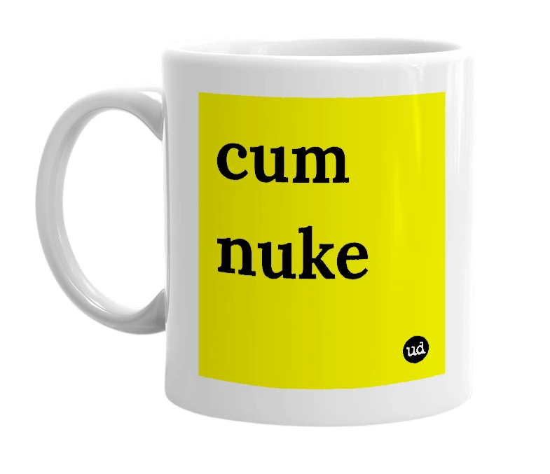 White mug with 'cum nuke' in bold black letters