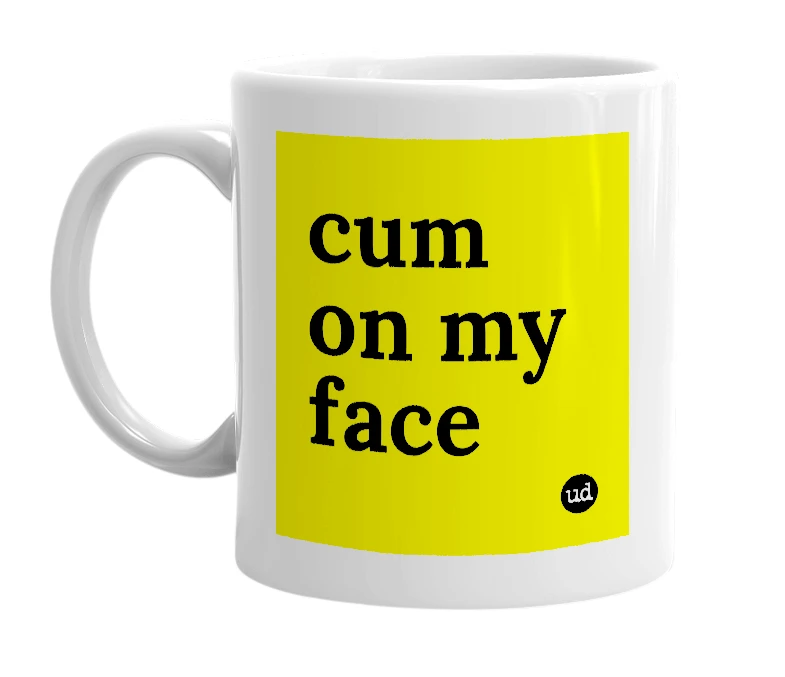 White mug with 'cum on my face' in bold black letters