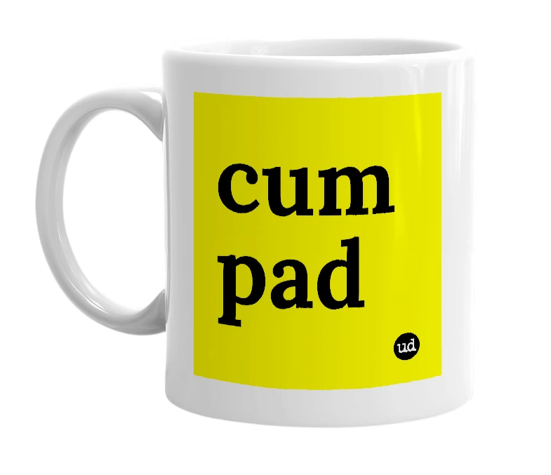 White mug with 'cum pad' in bold black letters