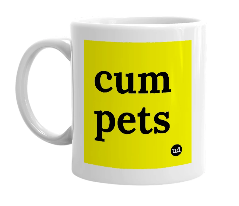 White mug with 'cum pets' in bold black letters