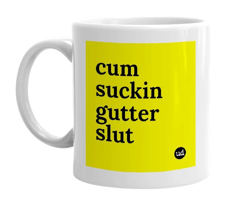 White mug with 'cum suckin gutter slut' in bold black letters