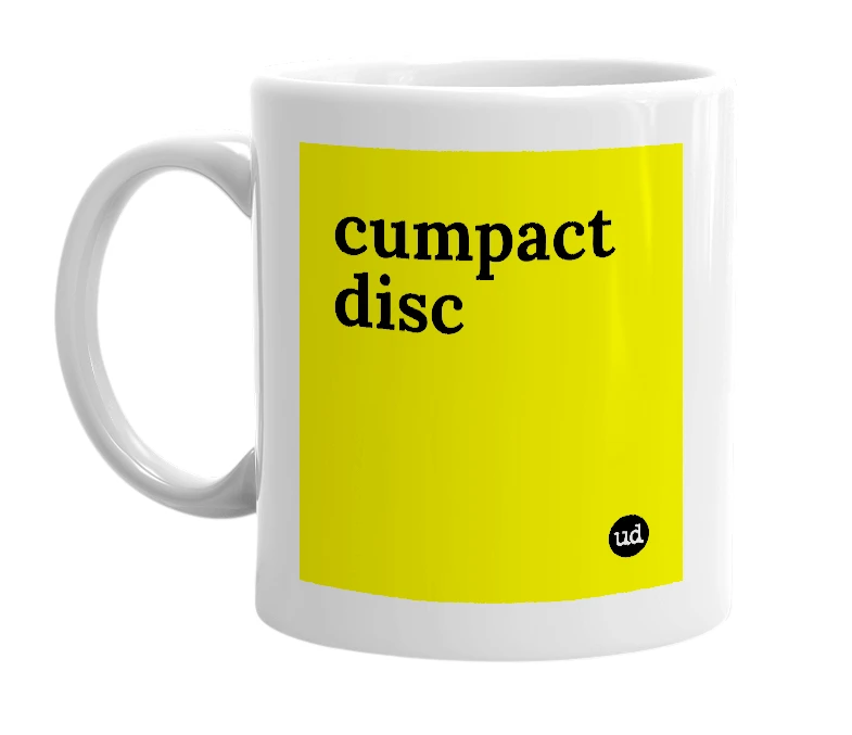 White mug with 'cumpact disc' in bold black letters