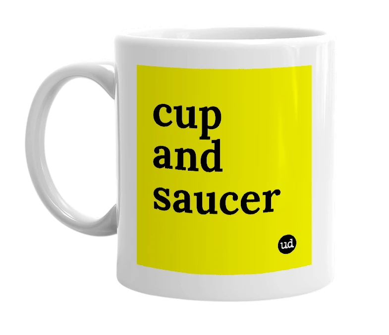 White mug with 'cup and saucer' in bold black letters