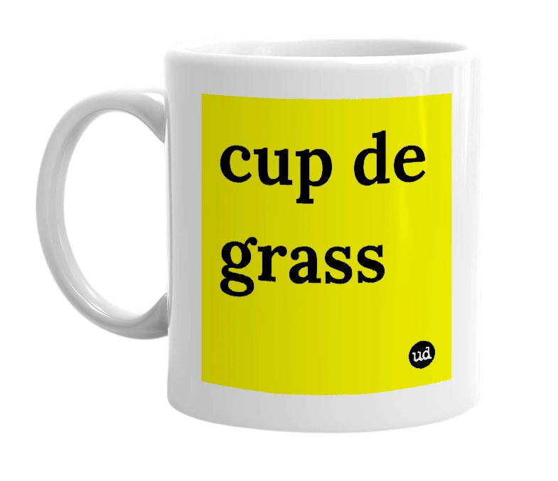 White mug with 'cup de grass' in bold black letters