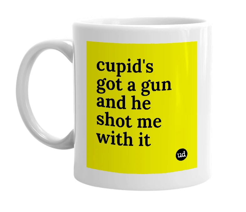 White mug with 'cupid's got a gun and he shot me with it' in bold black letters