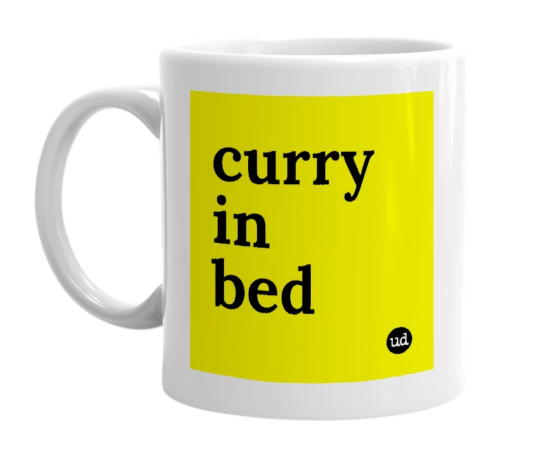 White mug with 'curry in bed' in bold black letters