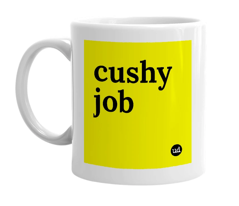 White mug with 'cushy job' in bold black letters