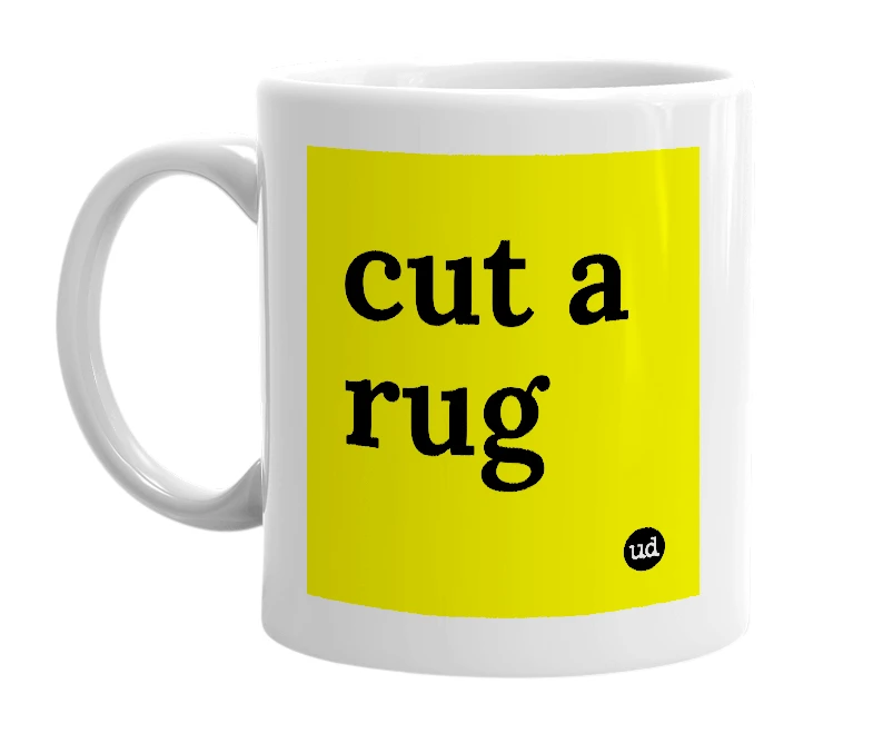 White mug with 'cut a rug' in bold black letters