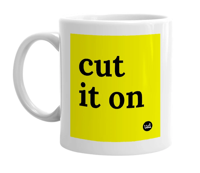 White mug with 'cut it on' in bold black letters
