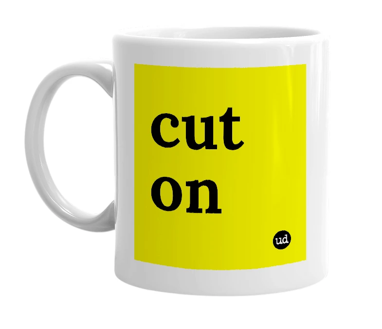 White mug with 'cut on' in bold black letters