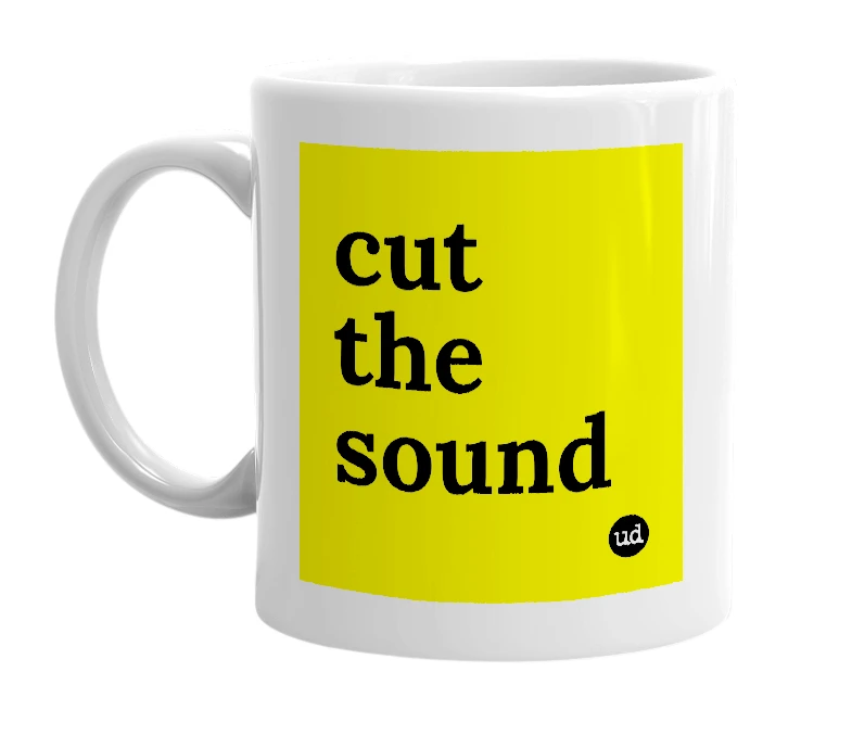 White mug with 'cut the sound' in bold black letters
